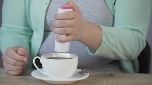 Obese Lady Replacing Sugar on Sweetener and Putting Into the Tea, Diabetes