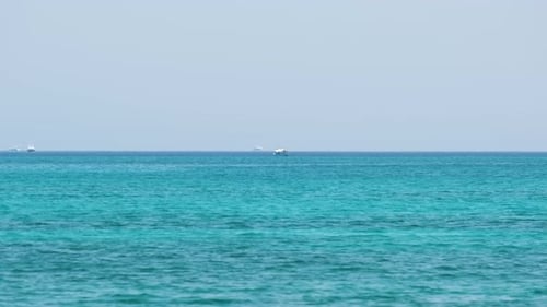 Closeup Seascape Surface of Blue Sea Water with Small Ripple Waves