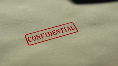Confidential Stamp on a Paper Document