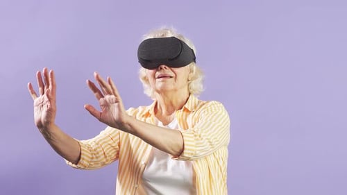 Senior Woman Enjoys Immersive VR Experience
