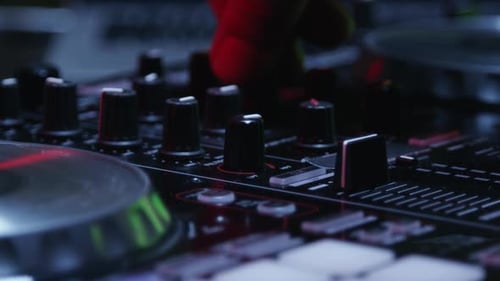 DJ Mixing Board Control Adjustments Close Up