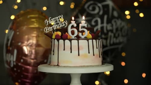 Elegant Birthday Cake with Candles for 65th Birthday