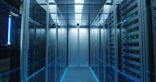 Long Hallway Full Server Racks in a Modern Data Center