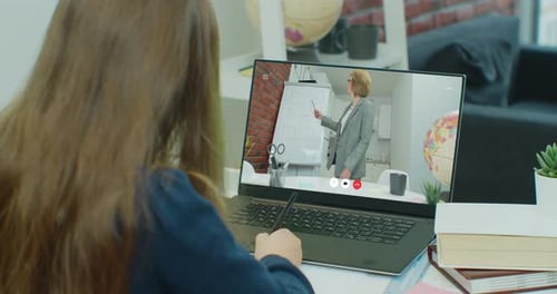 Teen Girl School College Student Study Distance Learning Talk with Online Teacher on Laptop Screen