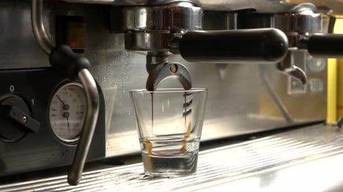 Espresso Being Brewed into a Glass