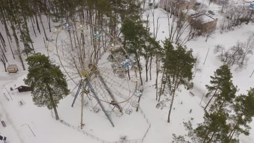 Old View Wheel In Winter In The Forest