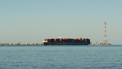 Industrial Container Naval Ship is Passing on the Strict of Messina in the Sea