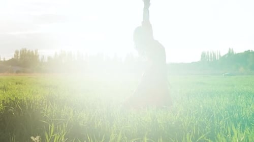 Beautiful Spanish Brunette Woman in Red Dress Dancing at Sunset in Wheat Field Slow Motion Shot
