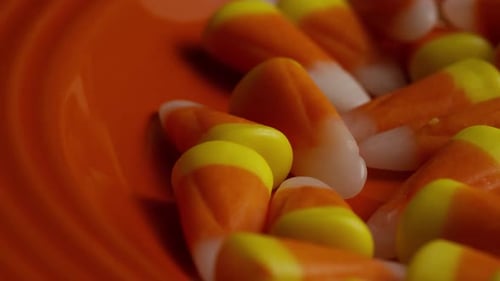 Candy Corn Piled High on Orange Plate