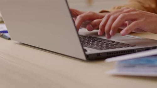 Close up hands of business man working with Computer laptop communication with customer
