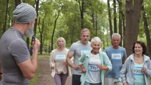 Marathon Runners Coached in Sunny Urban Park
