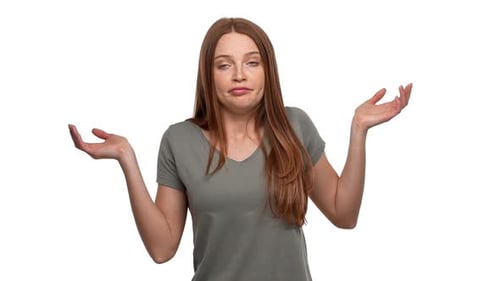 Portrait of Indecisive Woman 20s Shrugging and Throwing Up Hands Meaning Have No Idea Isolated Over