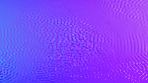 Strong Vibration Lifts Drops Milk with Pink Blue Tint Upward