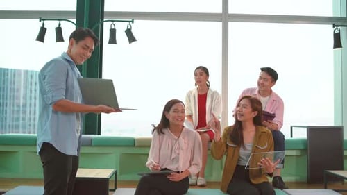 Group high school students explain and present about program project with teacher in the classroom