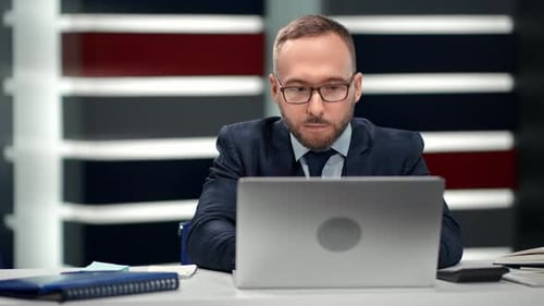 Focused Male Boss in Suit Tie Working Laptop Pc at Modern Office Workplace
