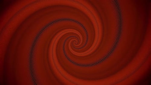 Red hypnotic spiral rotates slowly