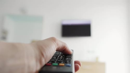 Closeup of Switching Channels Tv