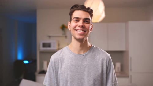 Smiling Young Adult in Home Setting Portrait