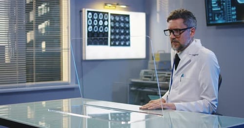 Doctor Using Transparent Display Screen