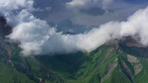 Aerial View of Green Mountains with Clouds