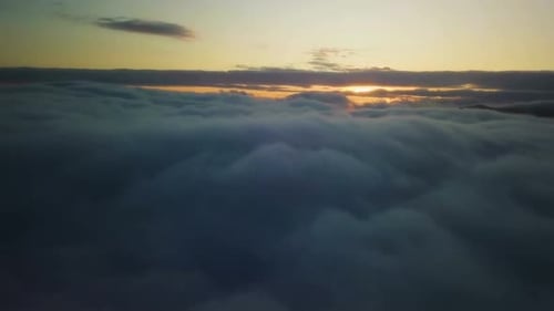Aerial View of Clouds at Sunset