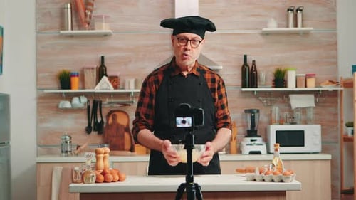 Chef Making a Cooking Video in Kitchen