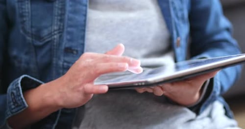 Woman Using Digital Tablet Computer