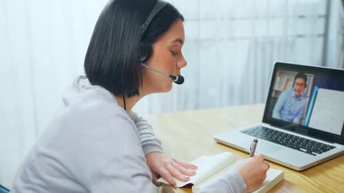 Focused Young Adult Learning Online from Home