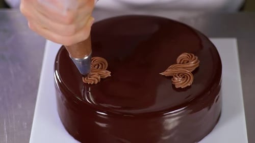 Pastry Chef Decorating Delicious Chocolate Cake