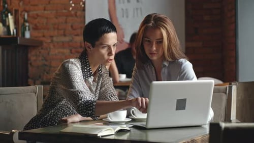 Businesswomen Working in the Cafe