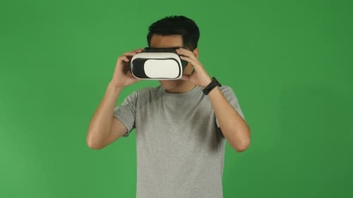 Asian Man Using Virtual Reality