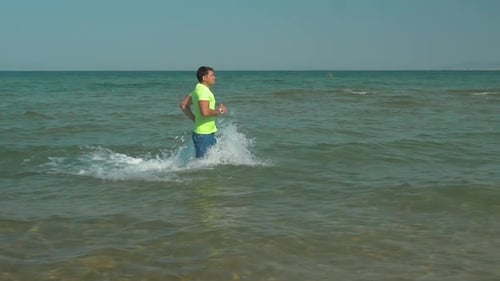 Man having run training in the water