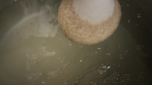 Slow motion footage of beer home brewing supplies and processes