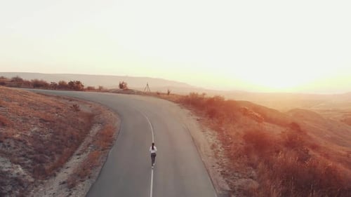 Running Woman on the Road