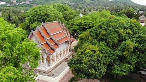 Classic Buddhist Temple Between Forest. From Above Drone View Buddhist Monastery Between Green Trees