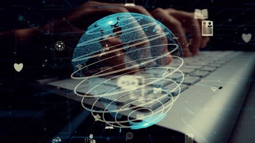 Fingers Typing With Futuristic Globe Graphic Overlay