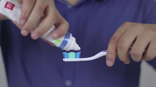 Toothpaste Dropping A Toothbrush