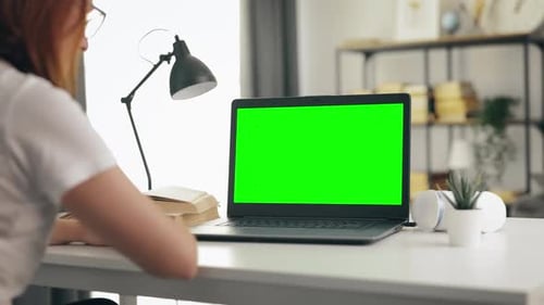 Woman with Laptop Green Screen