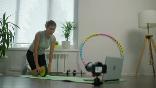 Woman Housewife Doing Fitness Exercises For Her Health