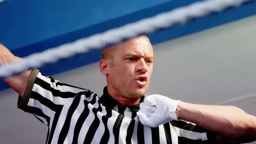 Portrait of confidence referee in fitness studio