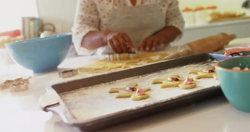 Woman Making Cookies in Her Bright Kitchen