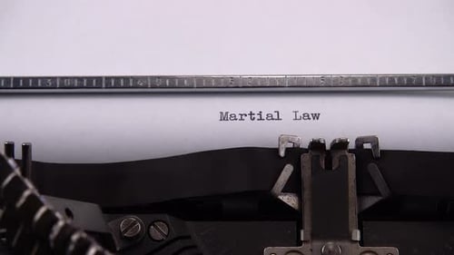 Typewriter Types the Words "Martial Law"