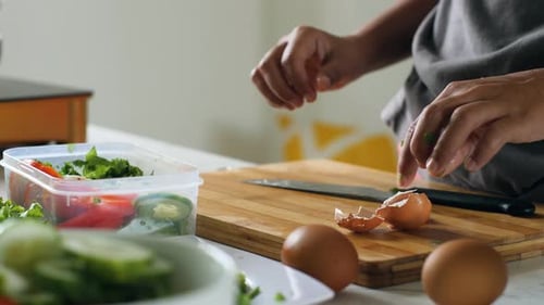 Preparing Healthy Lunch with Tomato and Boiled Egg
