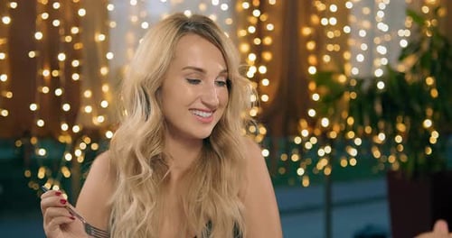 Man Feeds Girlfriend with Cheesecake Having Date in Cafe