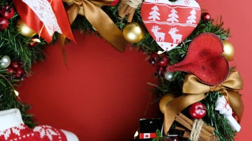 Festive Christmas Wreath on Red Background