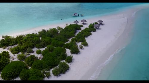Aerial drone shot seascape of beautiful tourist beach journey by blue ocean with clean sandy backgro