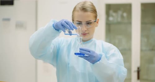 Female Scientist Working in Laboratory