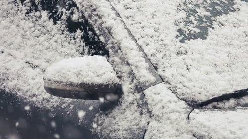 Car Covered in Fresh, Thick Winter Snow