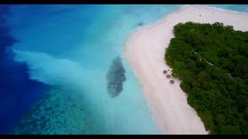 Aerial top down landscape of relaxing lagoon beach vacation by blue sea and white sandy background o