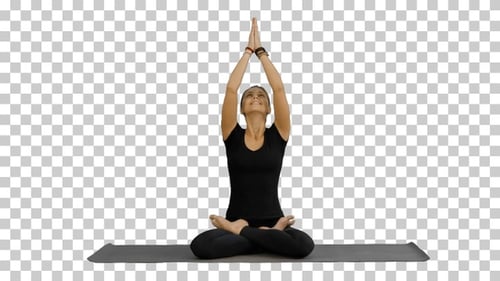 Young woman practicing yoga sitting in, Alpha Channel
